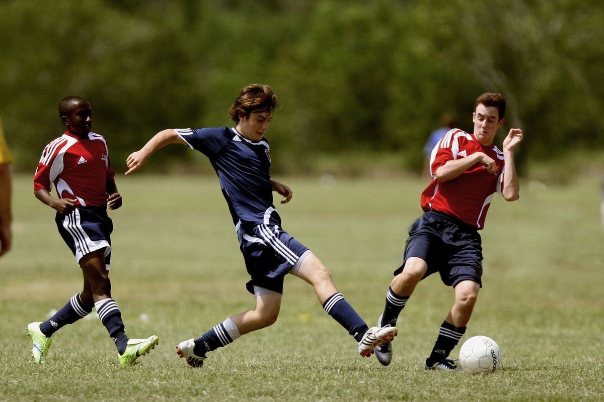Crampons de foot en Suisse : FG, SG, AG ou TF ?