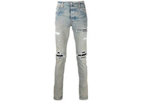 AMIRI Distressed Finish Ripped Skinny Jeans Light Indigo Blue