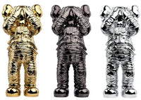 KAWS Holiday Space Figure Gold/Black/Silver Set