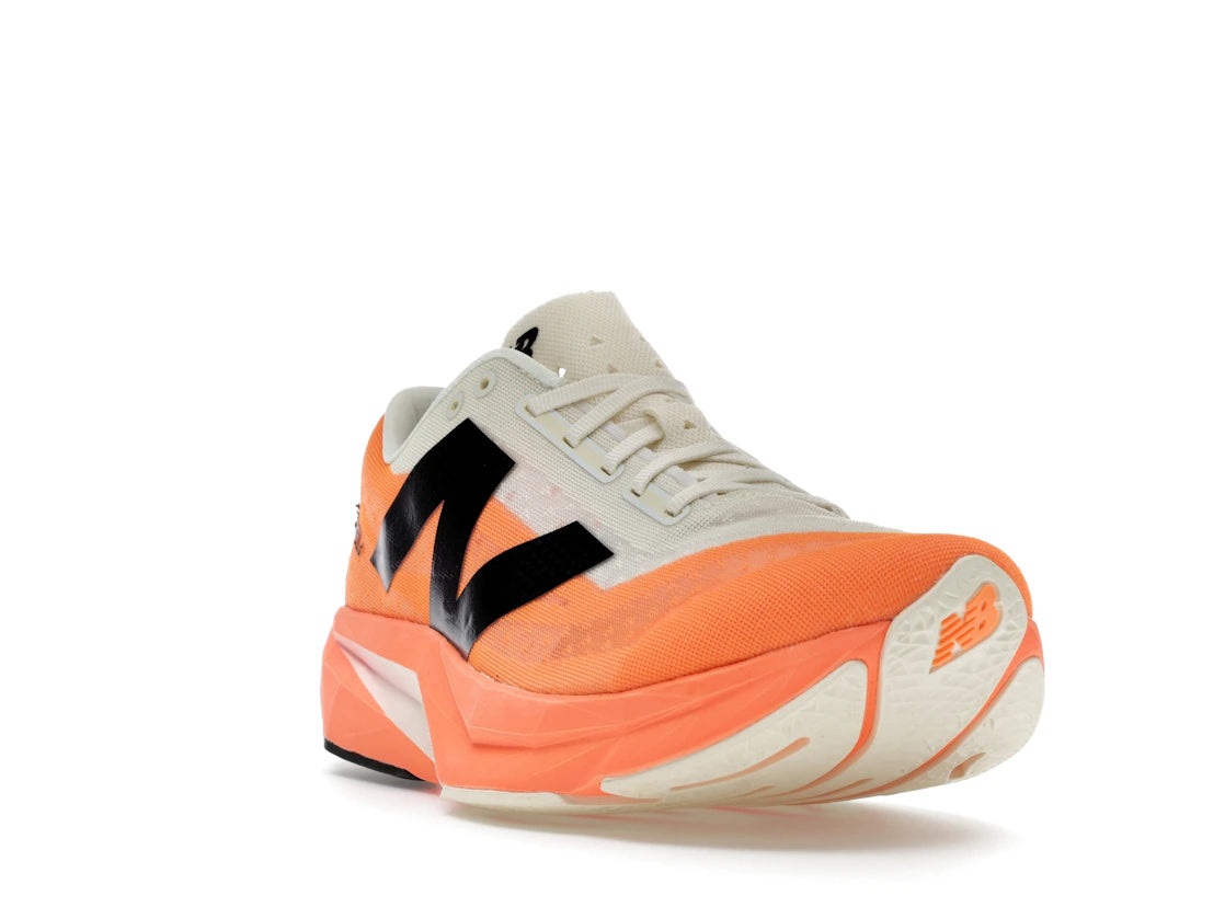 New Balance FuelCell Rebel v4 Hot Mango Black - vue secondaire A