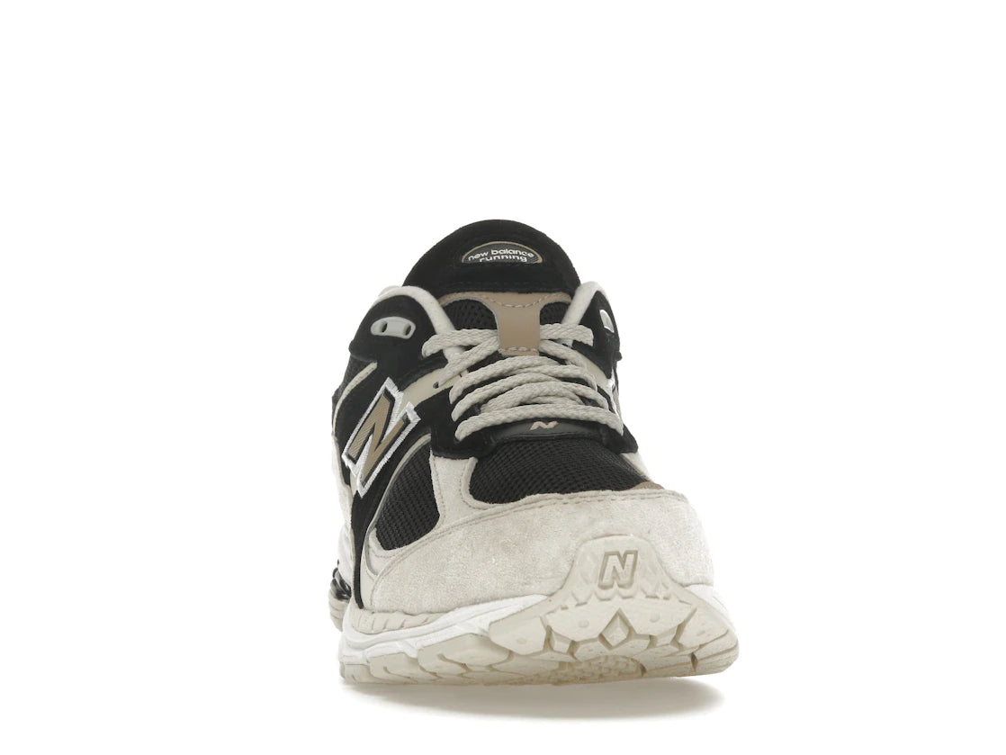 New Balance 2002R Schwarz Beige Braun - vue secondaire A