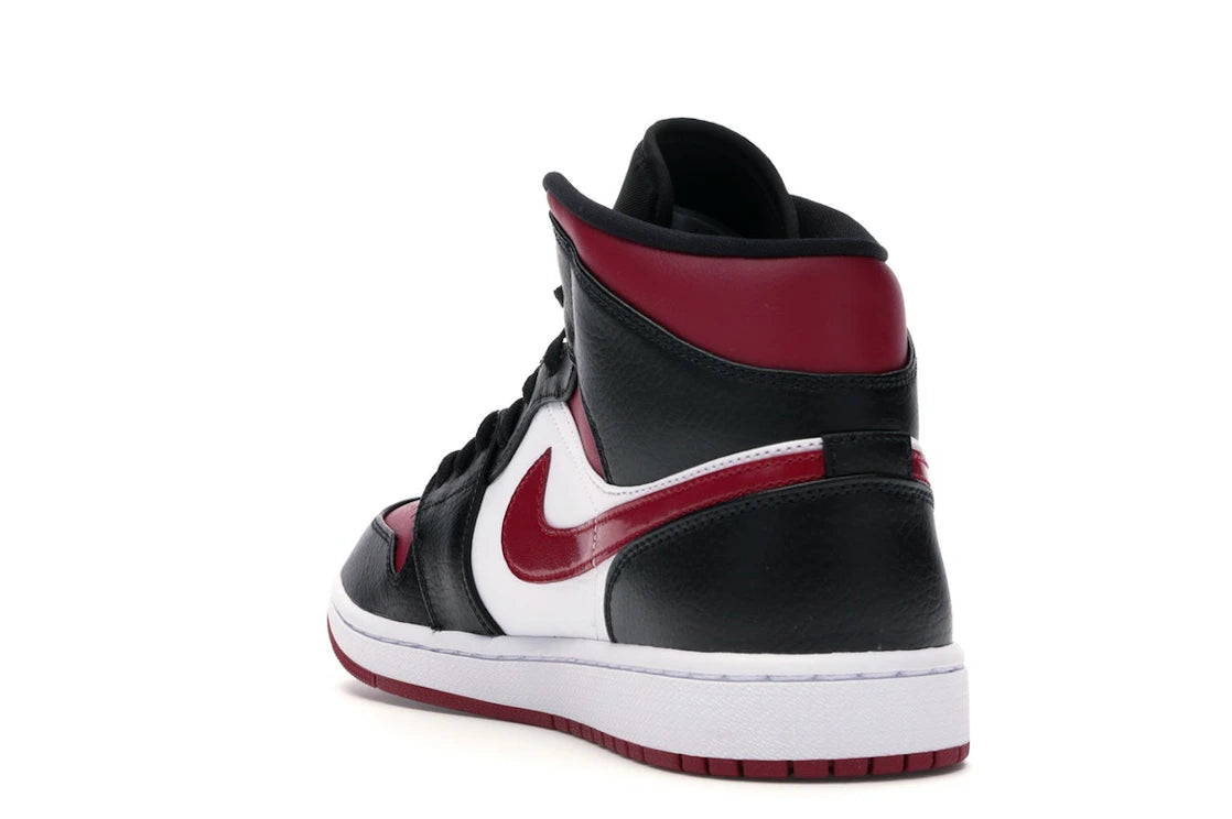 Jordan 1 Mid Bred Toe - vue secondaire B